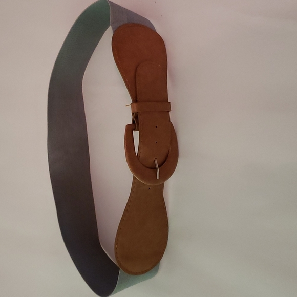 This belt is in excellent condition. It is 38in and stretches up to 52in. - Picture 1 of 5